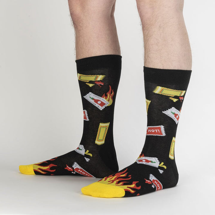 Extra Hot sauce socks worn on a model&