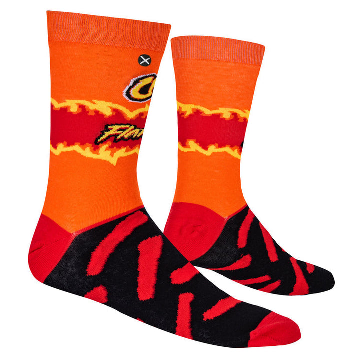 Side profile of the orange Cheetos socks with flame band and red striped foot