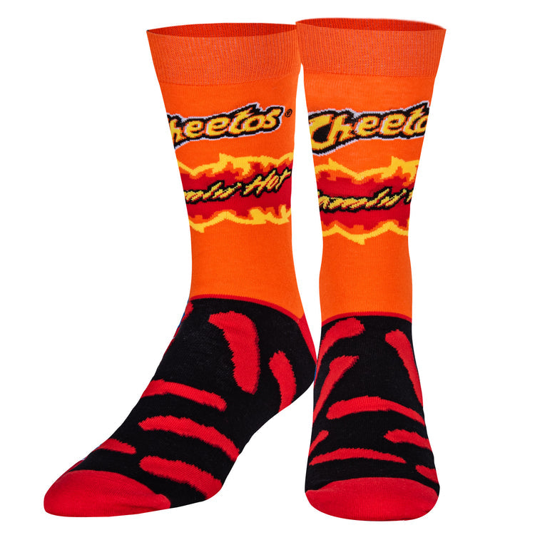 Front view of Cheetos crew socks showing black-and-red striped foot resembling hot Cheetos