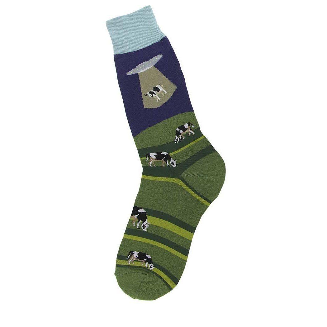 Men's crew sock with a navy sky, UFO beaming up a black-and-white cow, and green striped hills dotted with grazing cows; light blue cuff.