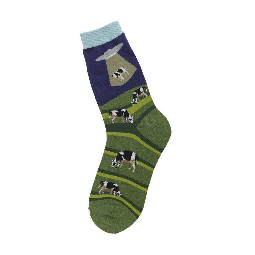 Women's green crew socks with cows and a UFO beaming one up