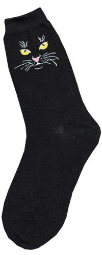 Women's solid black crew socks with a minimalist black cat face, yellow eyes, pink nose, and white whiskers near the cuff