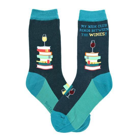 Pair of teal women's crew socks showing stacked books topped with wine glasses and "My book club reads between the wines!"
