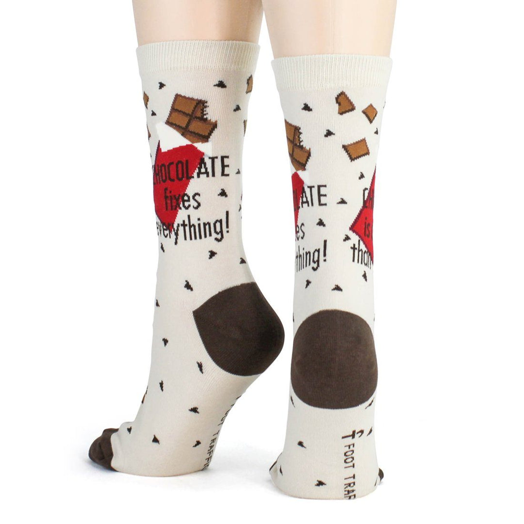 Heel-on view of the chocolate socks showing the dark brown heel and "Foot Traffic" branding on the sole