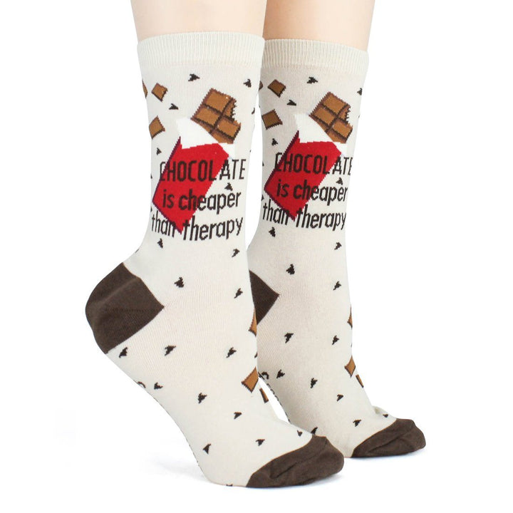 Front view of the chocolate socks worn on legs, showing the "cheaper than therapy" panel and brown heels