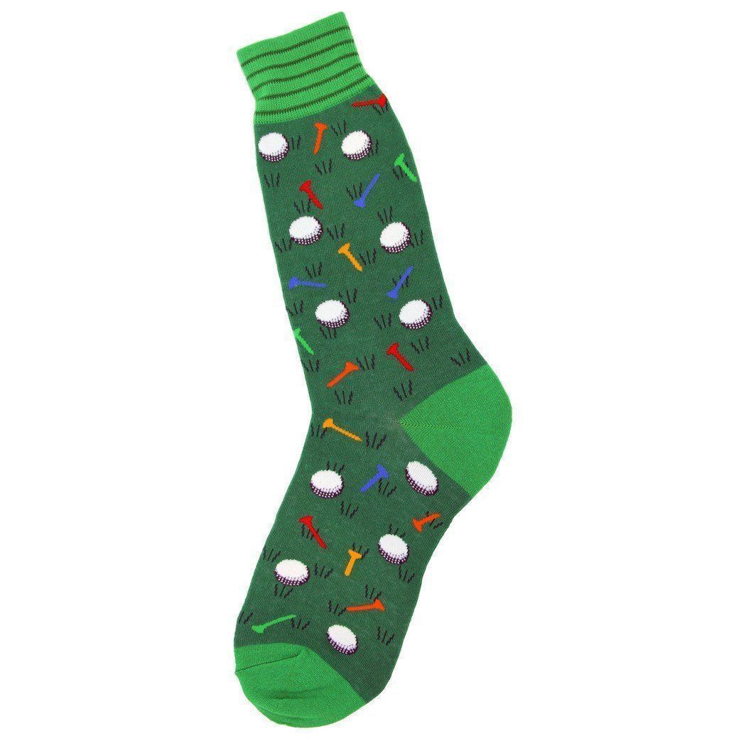 Men's green crew sock with white golf balls on grass tufts and scattered colorful tees; lime green heel, toe, and striped cuff.