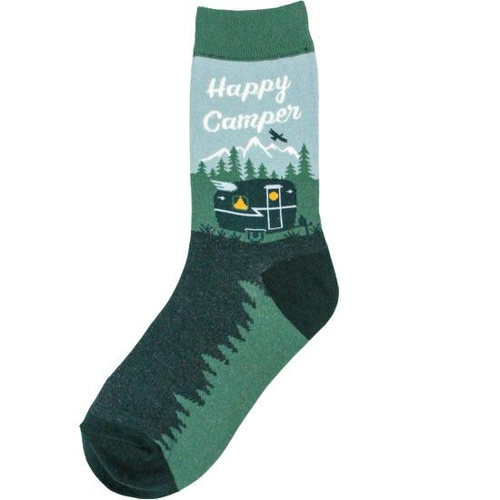 Women's green crew sock with a "Happy Camper" mountain scene and vintage trailer on a sky-blue panel