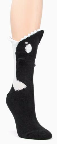 Black women's crew sock shaped like an orca whale with a 3D toothy mouth at the cuff