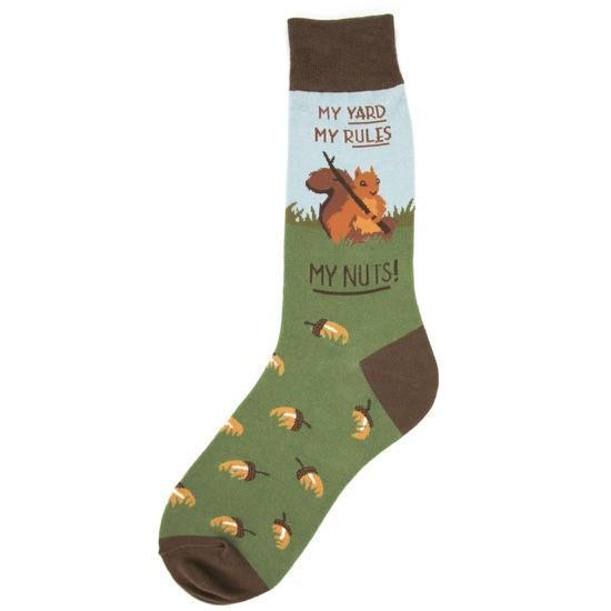 Flat-lay view of a men's green and brown crew sock showing a squirrel, scattered acorns, and the text "My Yard, My Rules, My Nuts!"