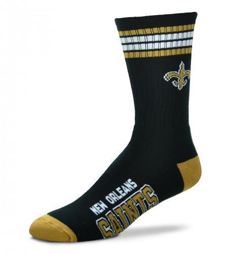 Black New Orleans Saints crew sock with gold and white stripes, gold fleur-de-lis logo, gold toe and heel, and team name across the foot