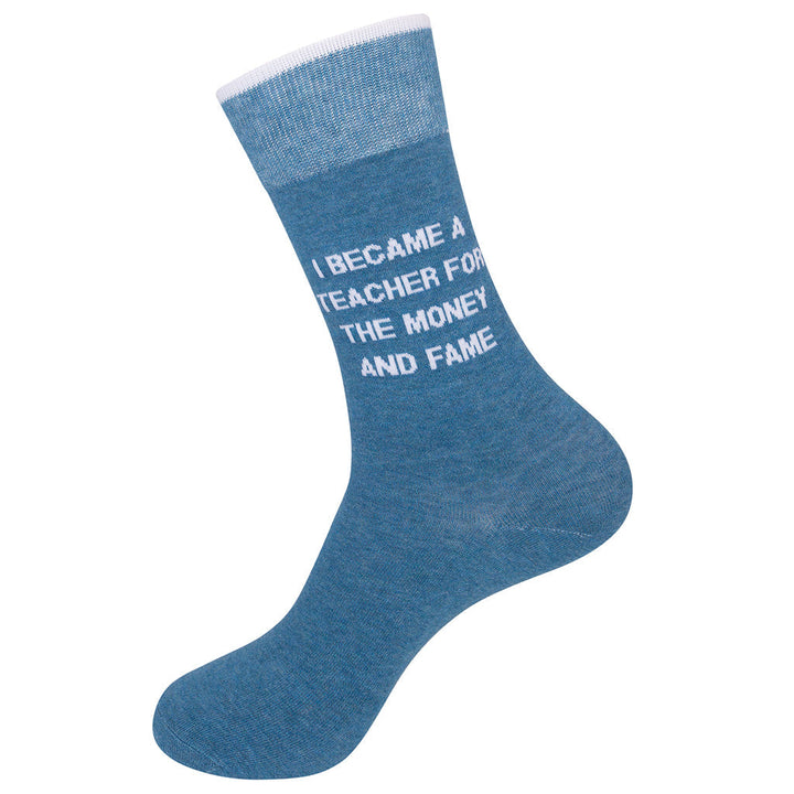 Single blue teacher crew sock shown in side profile on a display foot