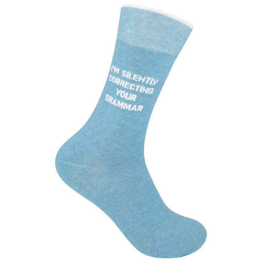 Heather-blue unisex crew sock on a foot form, printed with "I'm Silently Correcting Your Grammar" in white