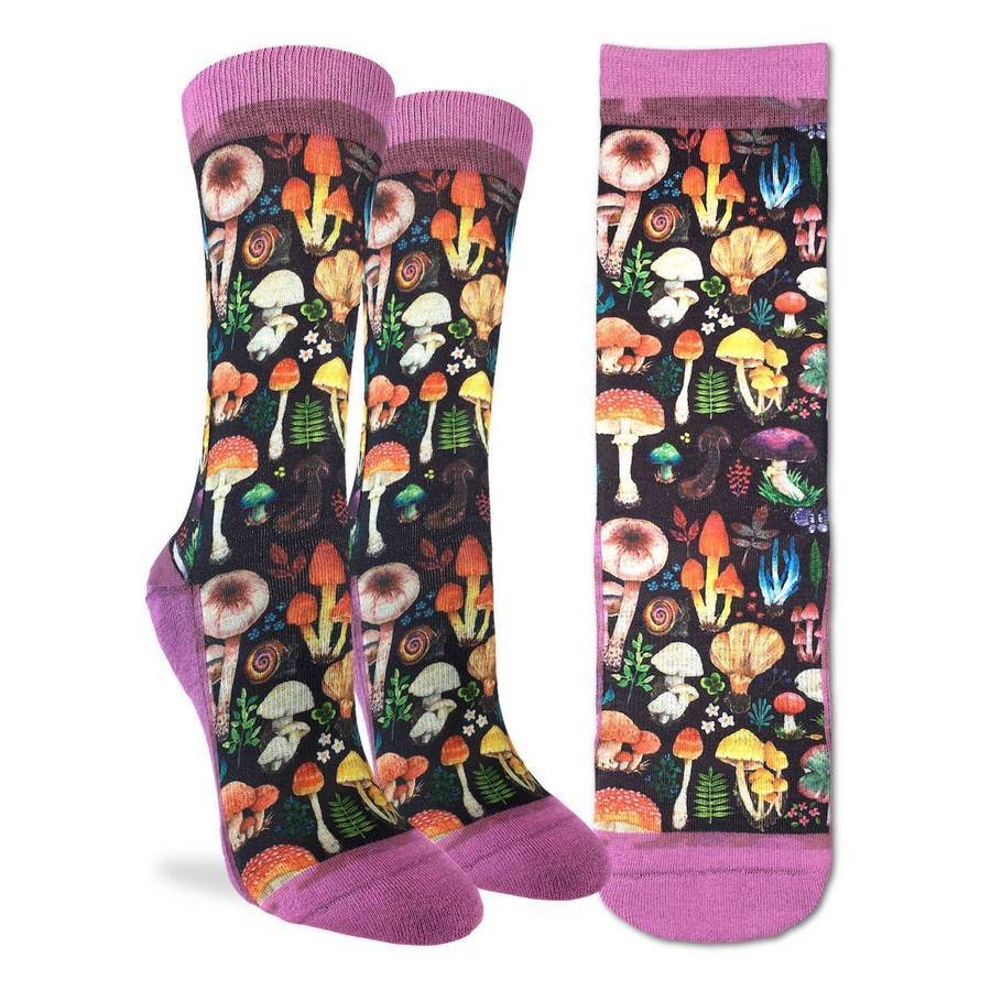 Women's crew socks on foot forms, patterned with watercolor mushrooms and botanicals with lavender cuffs and toes