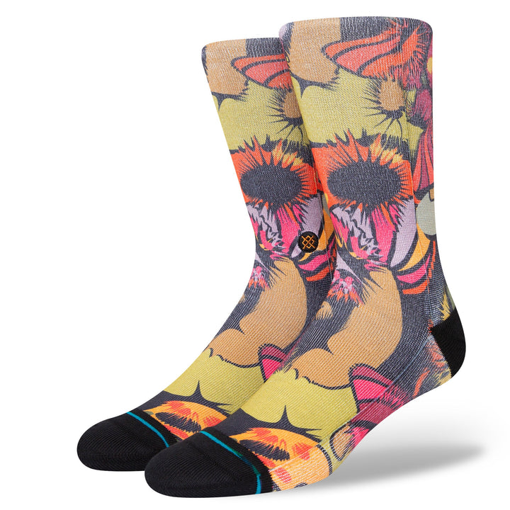 Pair of crew socks with a psychedelic all-over mushroom print in pink, orange and olive, display view