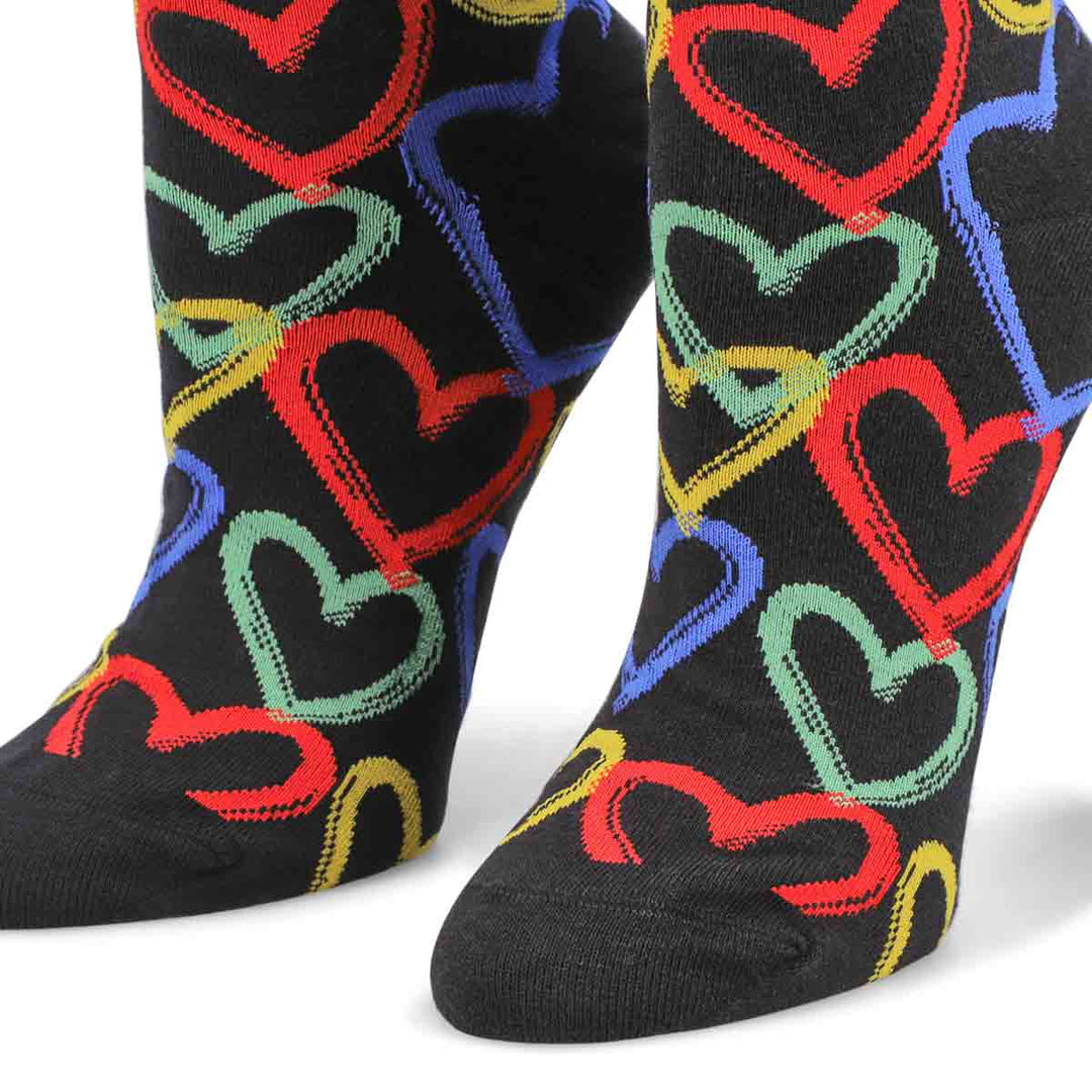 Close-up of the graffiti heart crew socks showing the paint-stroke red, blue, green, and yellow heart outlines