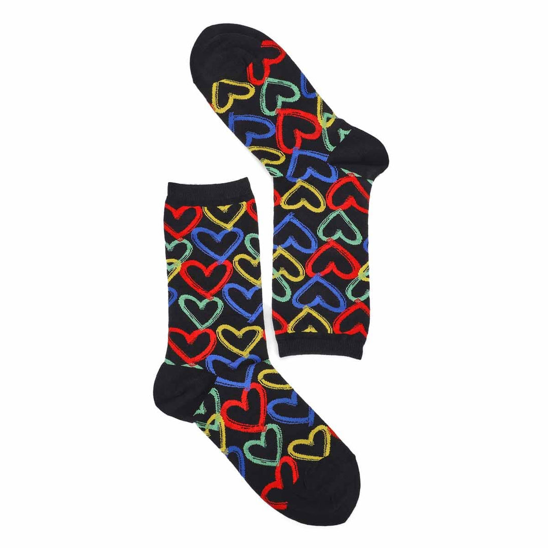 Overhead flat-lay of the graffiti hearts socks, one upright and one folded, showing multicolor hearts on black
