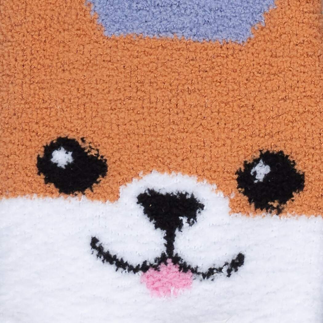 Close-up of the corgi face on the toe of the fuzzy slipper sock