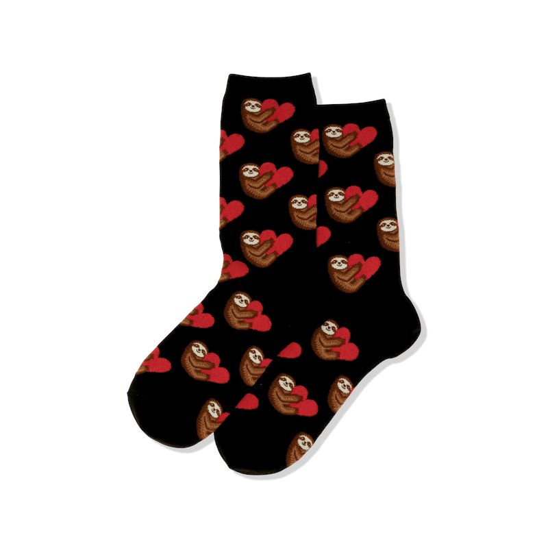 Pair of black women's Sloth Love crew socks displayed flat, with brown sloths hugging red hearts all over