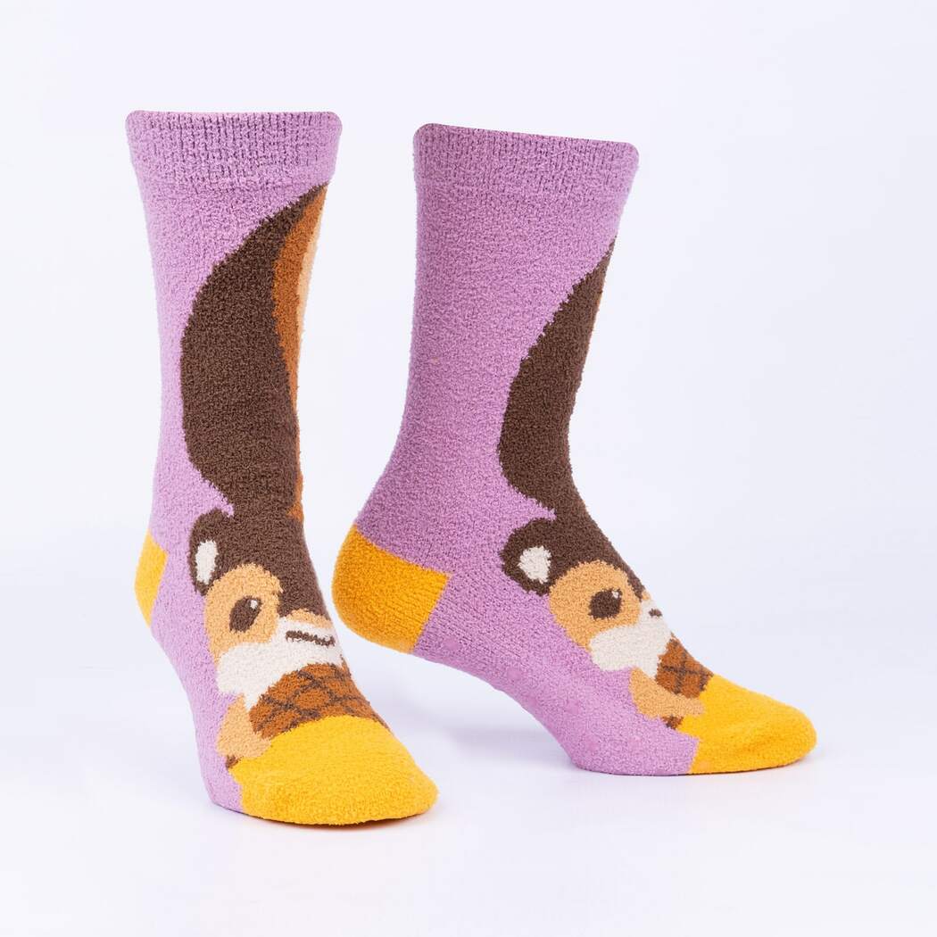 Pair of fuzzy lilac women's slipper socks with a chipmunk and acorn on the foot, a bushy brown tail up the leg, and golden-yellow toes