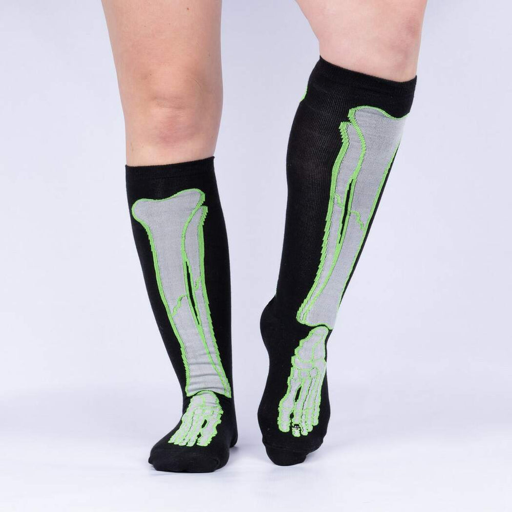 Front view of model wearing the skeleton-bone knee high socks showing leg bones up the shins