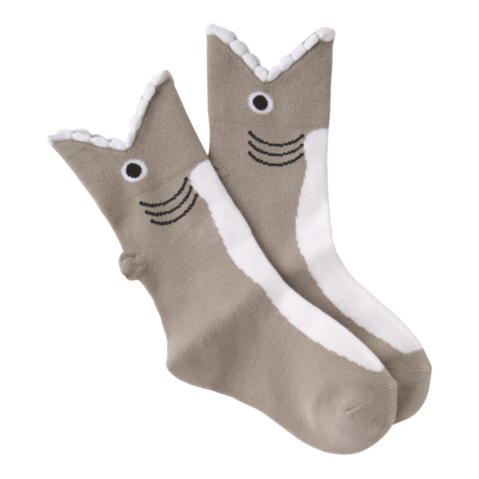 Pair of gray kids' shark crew socks with white 3D teeth at the cuff, eyes, gills, and a white belly