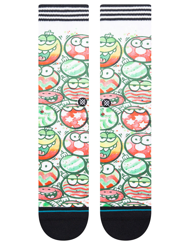 Front view of the Kevin Lyons monster crew socks, dense pattern of cartoon ornament characters on white