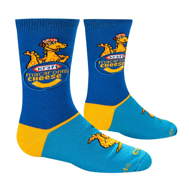 Top-down view of the Kraft Mac &amp; Cheese socks showing the logo on the leg and dinos on the foot