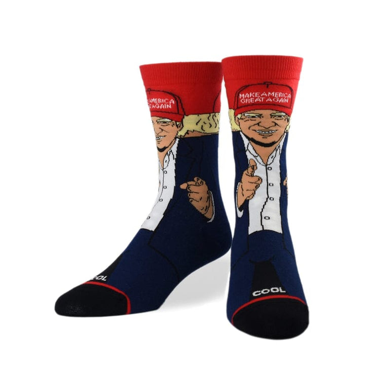 Front view of the MAGA caricature crew socks, showing the suit, white shirt, and red cap