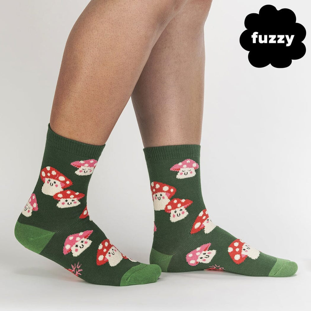 Women's mellow mushroom crew socks worn on legs, side view with fuzzy label