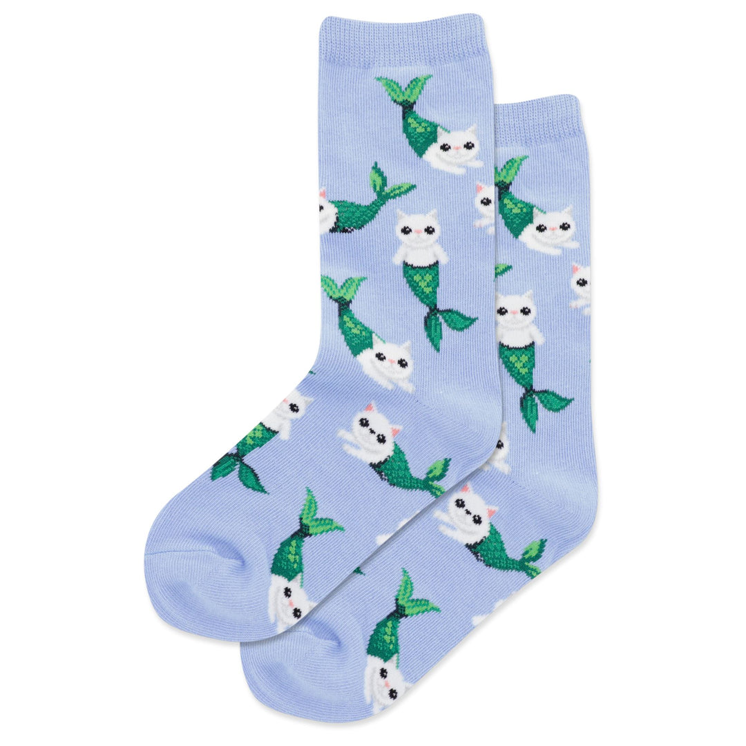 Pair of periwinkle blue kids' crew socks with white cats wearing green mermaid tails, shown flat and overlapping