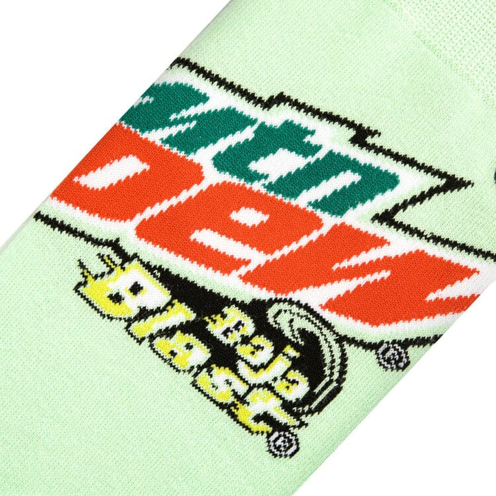 Close-up knit detail of the Mtn Dew Baja Blast logo on mint green