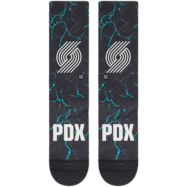 Front view of the Trail Blazers PDX socks showing the team logo and PDX lettering on the cracked teal pattern