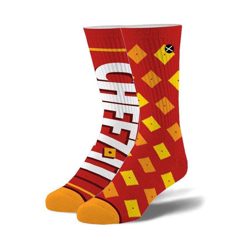 Pair of men's red Cheez-It crew socks with the Cheez-It logo, scattered cracker squares and orange toes