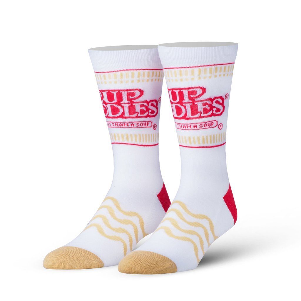 Men's white Cup Noodles crew socks displayed as a pair with the red logo, 'More Than A Soup' tagline, and golden noodle foot