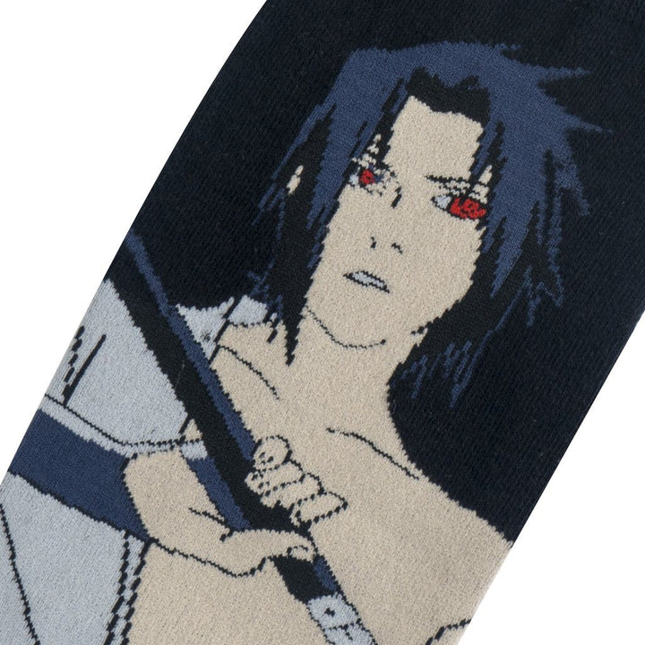Close-up of the Sasuke sock detail showing his face, red Sharingan eyes and spiky blue-black hair