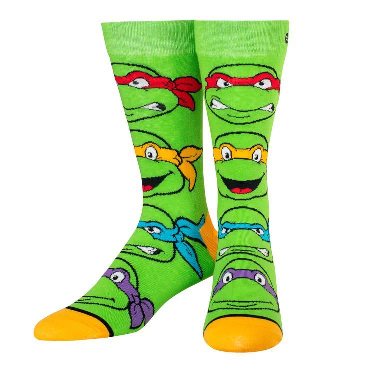 Pair of bright green kids' crew socks featuring the four Teenage Mutant Ninja Turtles' faces with colored masks