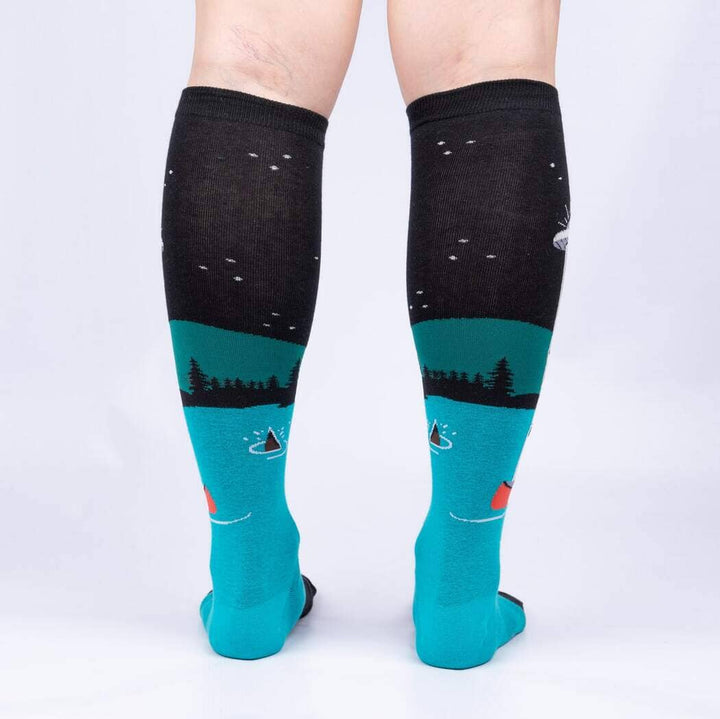 Back view of the UFO knee highs worn on legs, showing the starry sky and lake scene