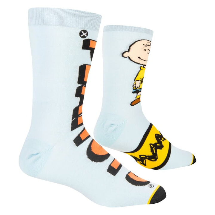 Top-down view of the Peanuts socks showing the orange logo and a standing Charlie Brown