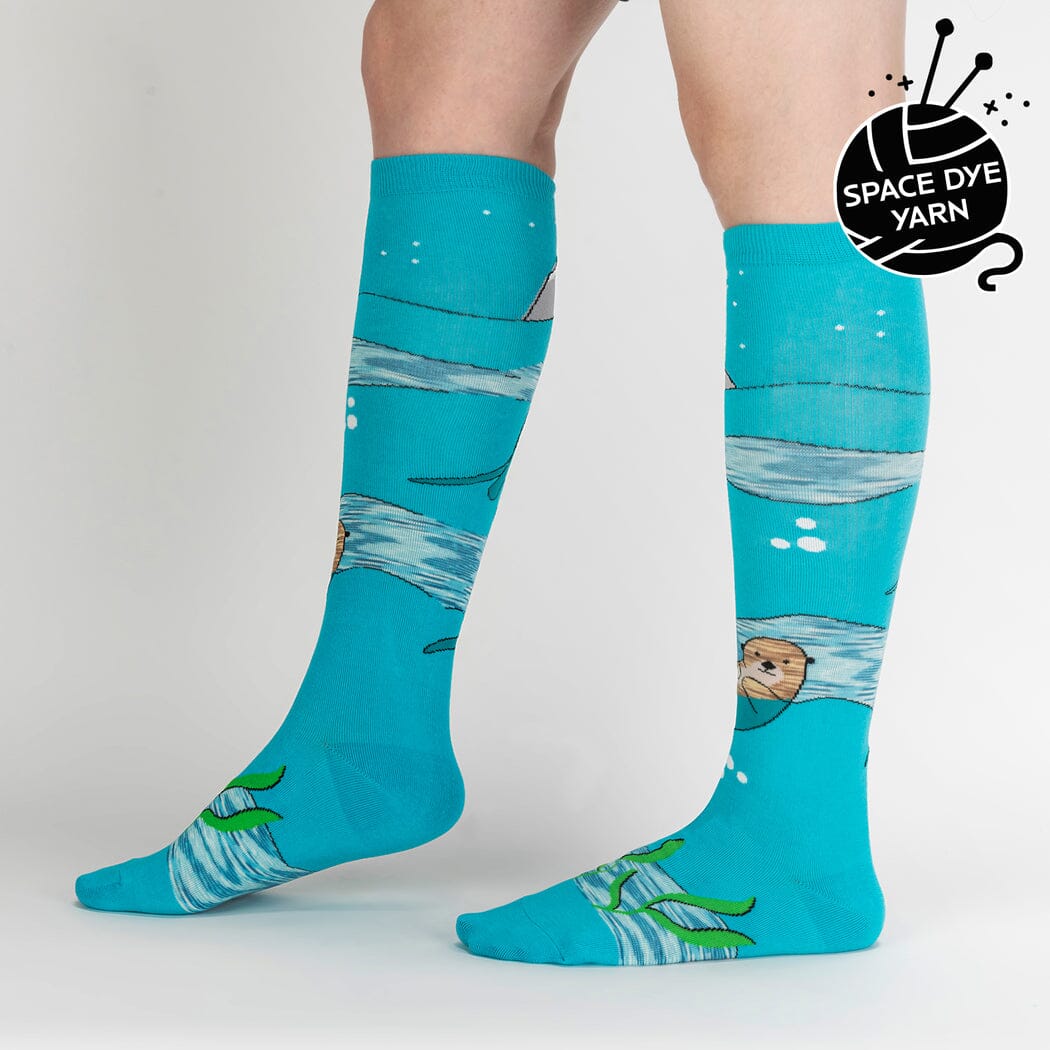 Aqua otter knee high socks worn on a model&