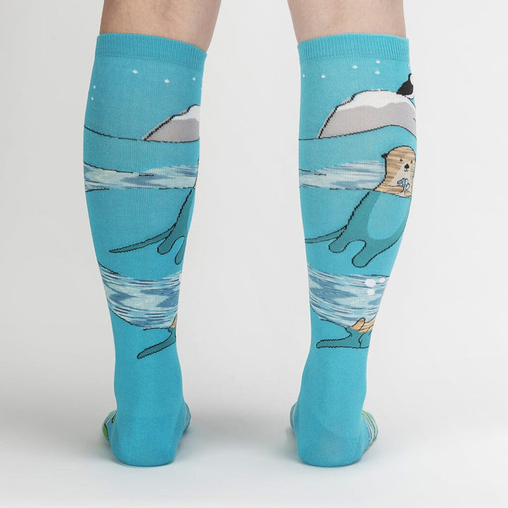 Back view of the aqua otter knee high socks worn on a model&