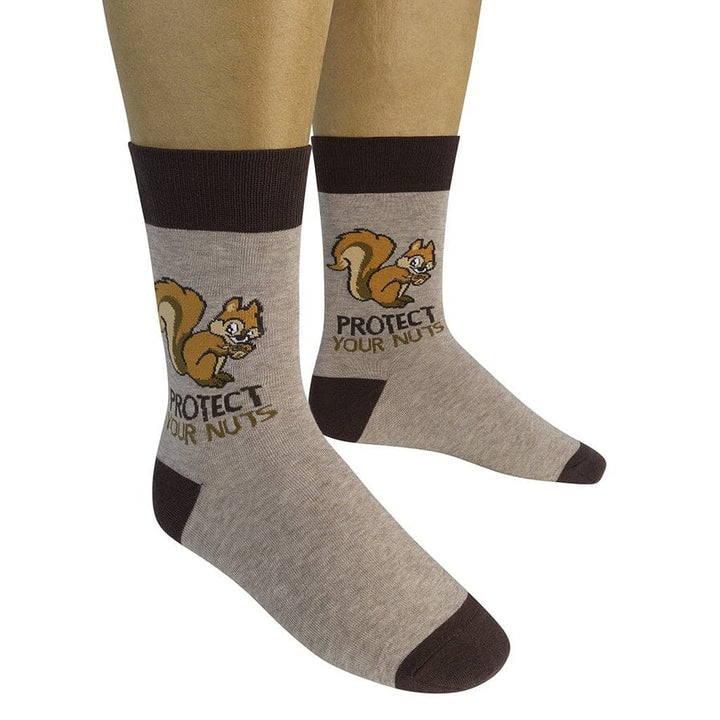 Two tan squirrel socks worn on a model showing the &