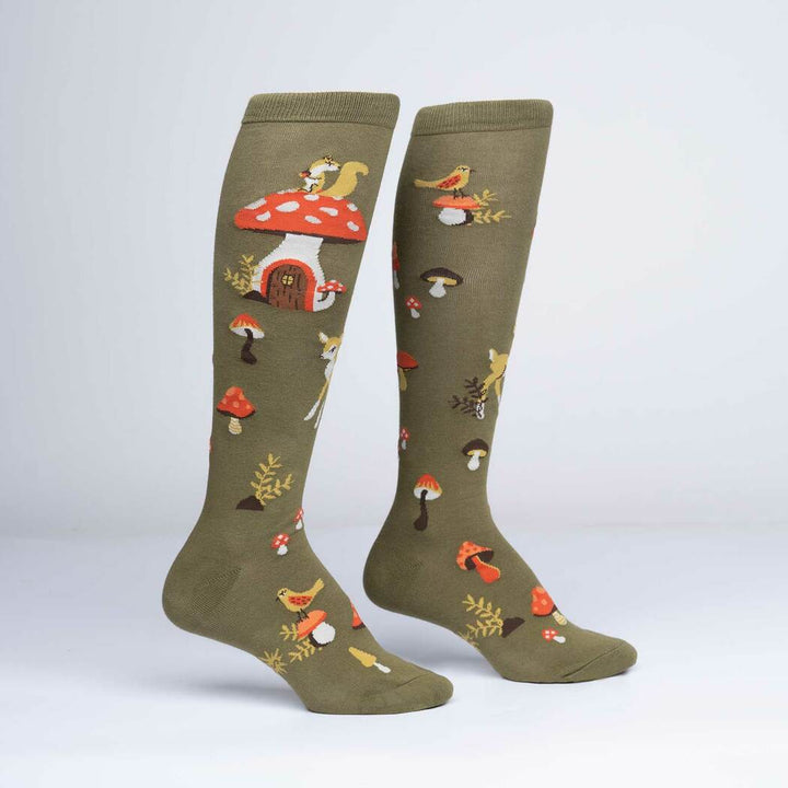 Pair of olive woodland mushroom knee high socks on display stands