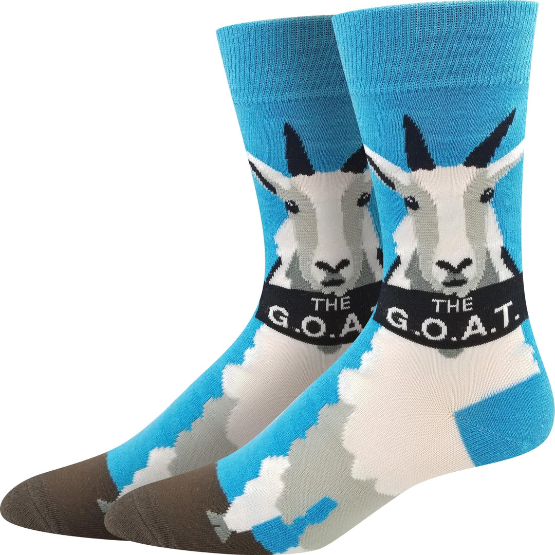 Men's sky-blue crew socks with a mountain goat above a black banner reading 'The G.O.A.T.', gray and brown foot