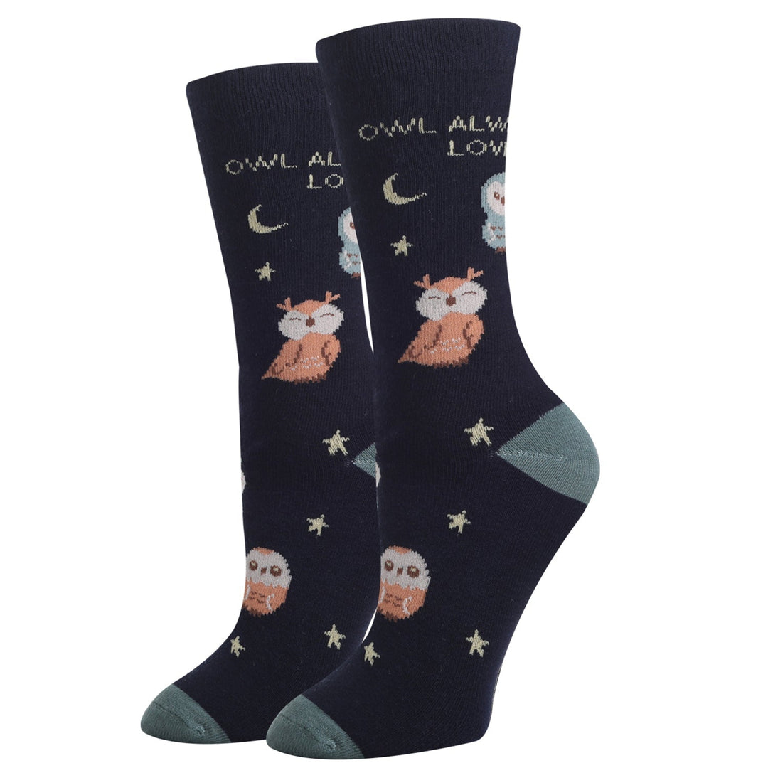 Pair of navy Owl Always Love You crew socks displayed flat, with cozy owls, gold stars, a crescent moon, and sage heels and toes