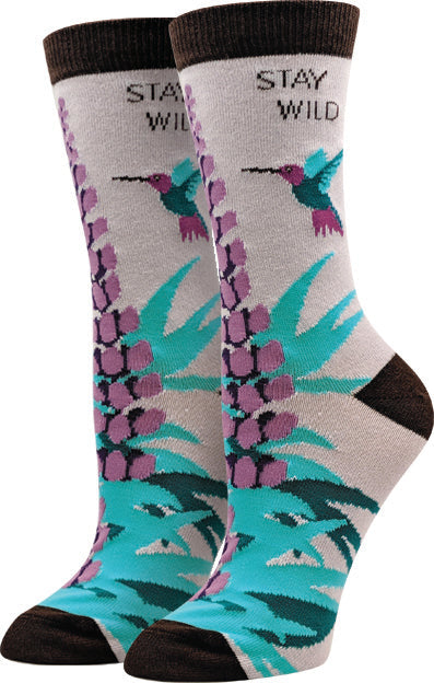 Gray women's crew socks with a hummingbird, purple lupine flowers, and the words Stay Wild