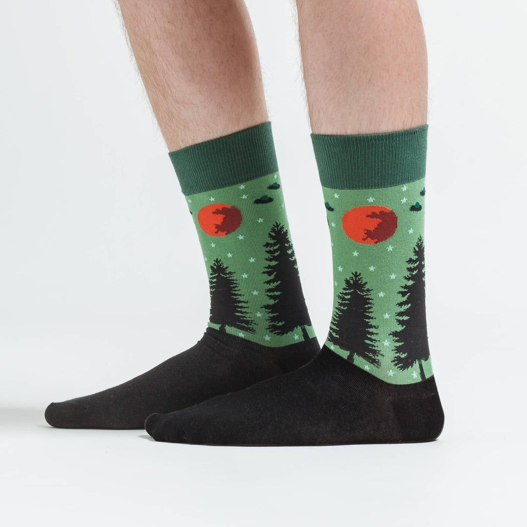 Another side view of the alien UFO crew socks with a red moon