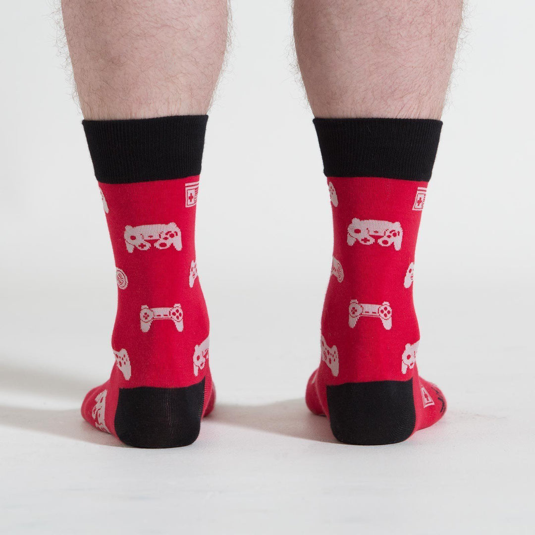 Back view of red video game controller crew socks on a model