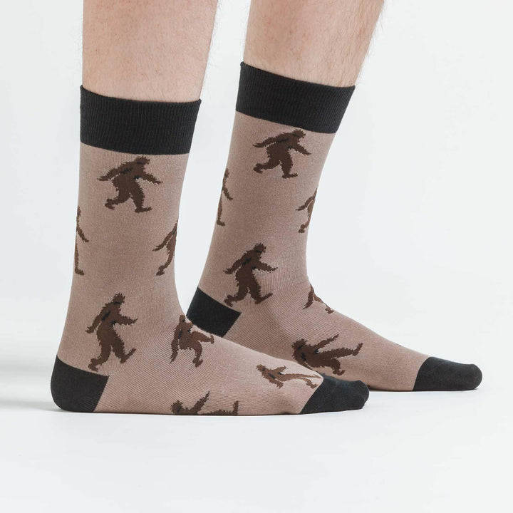 Sasquatch crew socks worn on a model, side view