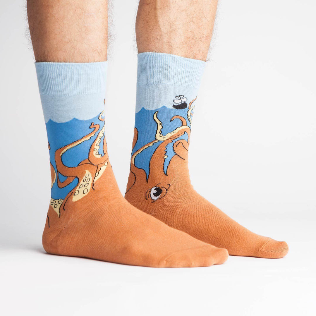 Side view of the giant squid crew socks worn on a man&