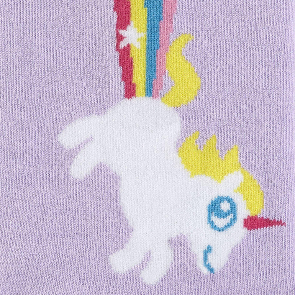 Close-up of a white unicorn launching a rainbow on a lavender sock